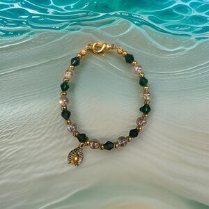Green/Crystal bracelet w dragon claw